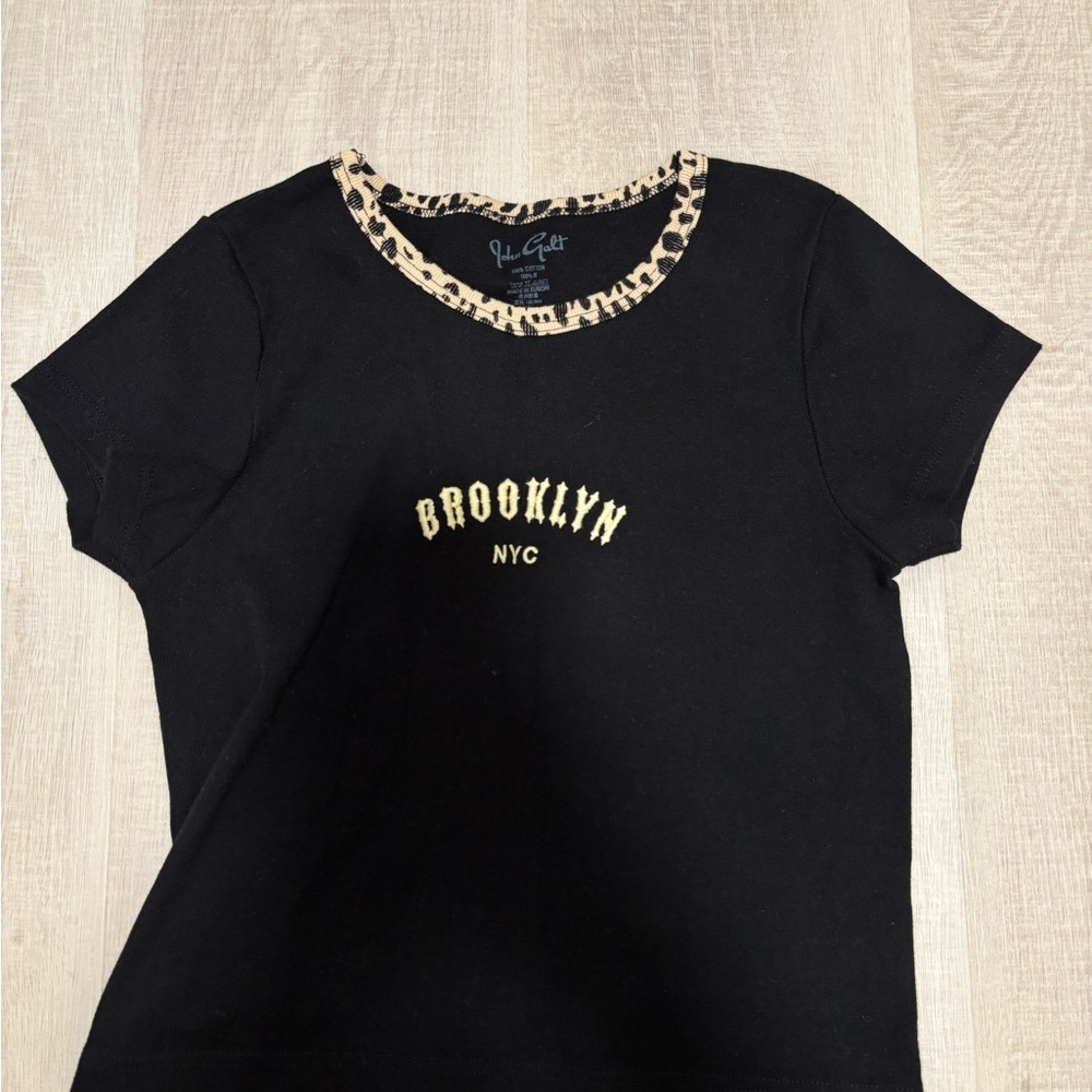 Brandy Melville Black Short Sleeve Tee with Leopard Trim and embroidered font